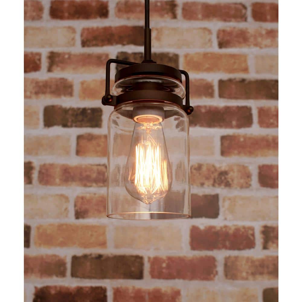 Wyer 8" Bronze Industrial Pendant Light with Clear Glass Shade