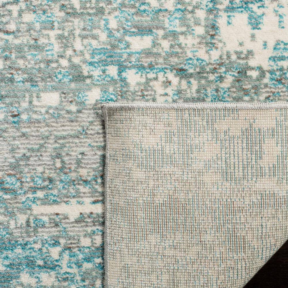 Teal Multi Abstract Synthetic Easy Care 3' x 5' Area Rug