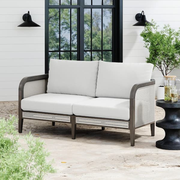 Twila Dark Brown Solid Wood Frame Outdoor Loveseat with Rattan Arms and White Linen Cushions