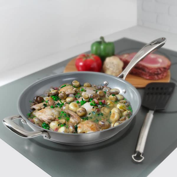 https://images.thdstatic.com/productImages/208ac603-319f-4db3-b448-3c37b2465e7b/svn/brushed-stainless-steel-chantal-skillets-slin63-32c-31_600.jpg