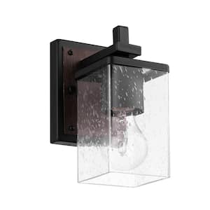Dakota 4.33 in. 1-Light Matte Black Vanity Light with Dark Faux Wood Accents and Clear Seeded Glass Shade
