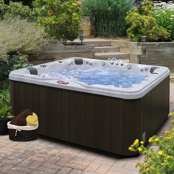 American Spas 7-Person 56-Jet Premium Acrylic Lounger Spa Hot Tub with Bluetooth Stereo System, Subwoofer and Backlit LED Waterfall