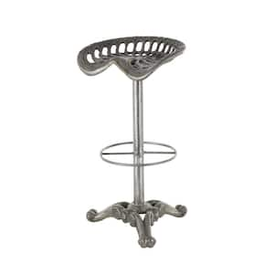 31 in. Silver Metal Weathered Antique Cast Iron Bar Stool with Cutout Textured Seat and Footrest