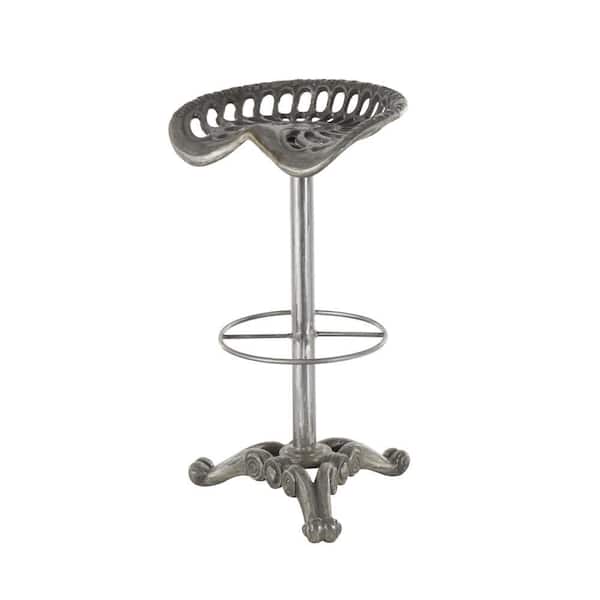 Litton Lane 31 in. Silver Metal Weathered Antique Cast Iron Bar Stool with Cutout Textured Seat and Footrest