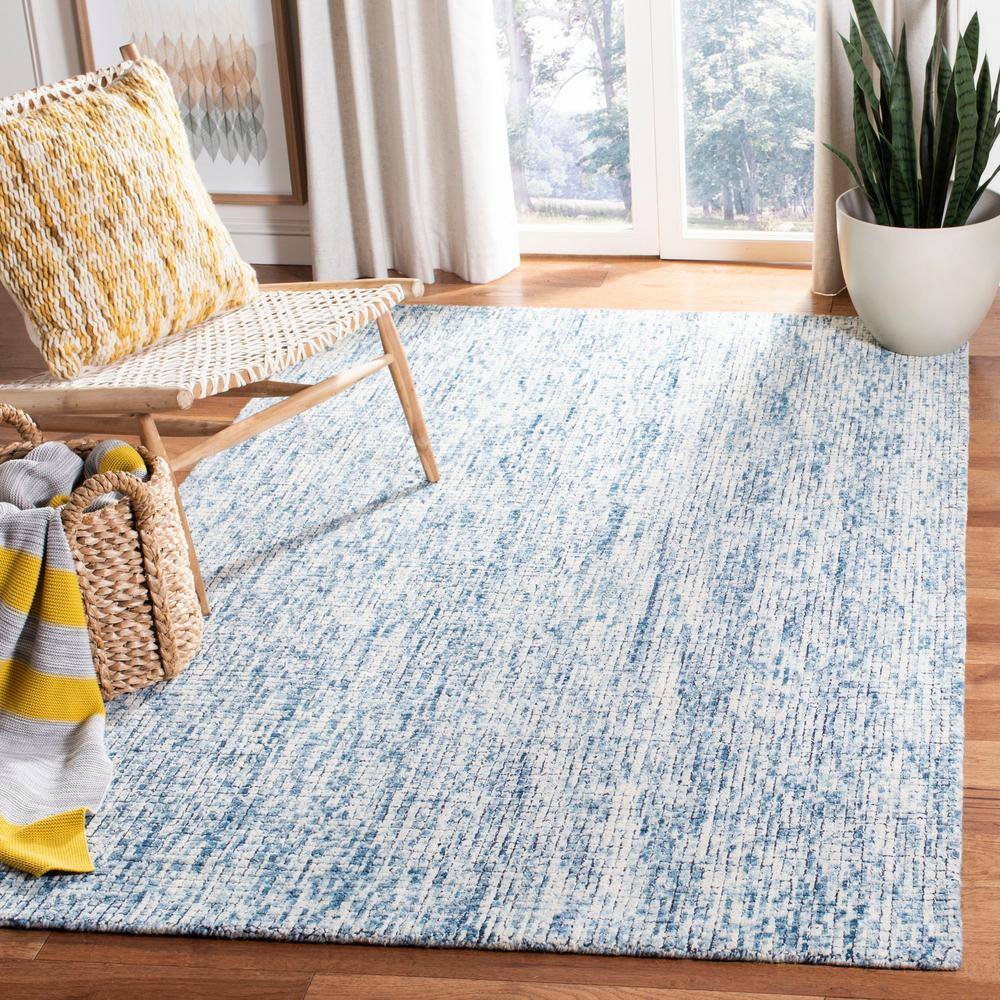 Ivory and Navy Abstract Wool Handmade Area Rug