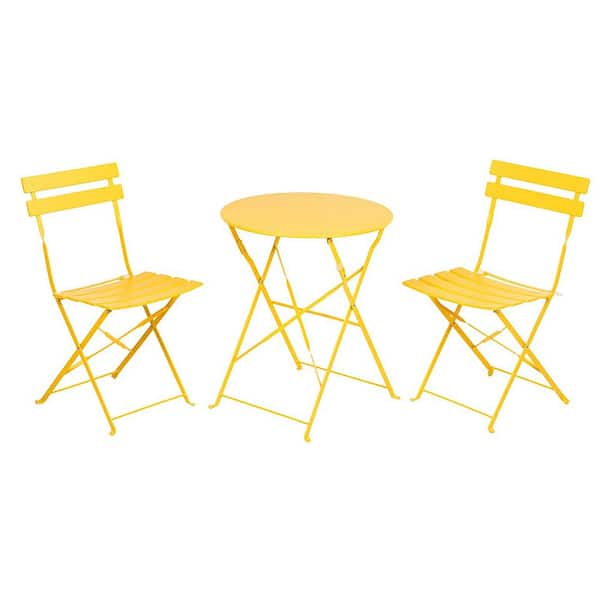 yellow table and chairs garden