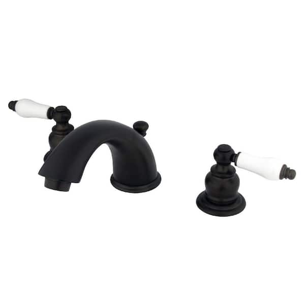 Kingston Brass Magellan 2-Handle 8 in. Widespread Bathroom Faucets with Plastic Pop-Up in Oil Rubbed Bronze
