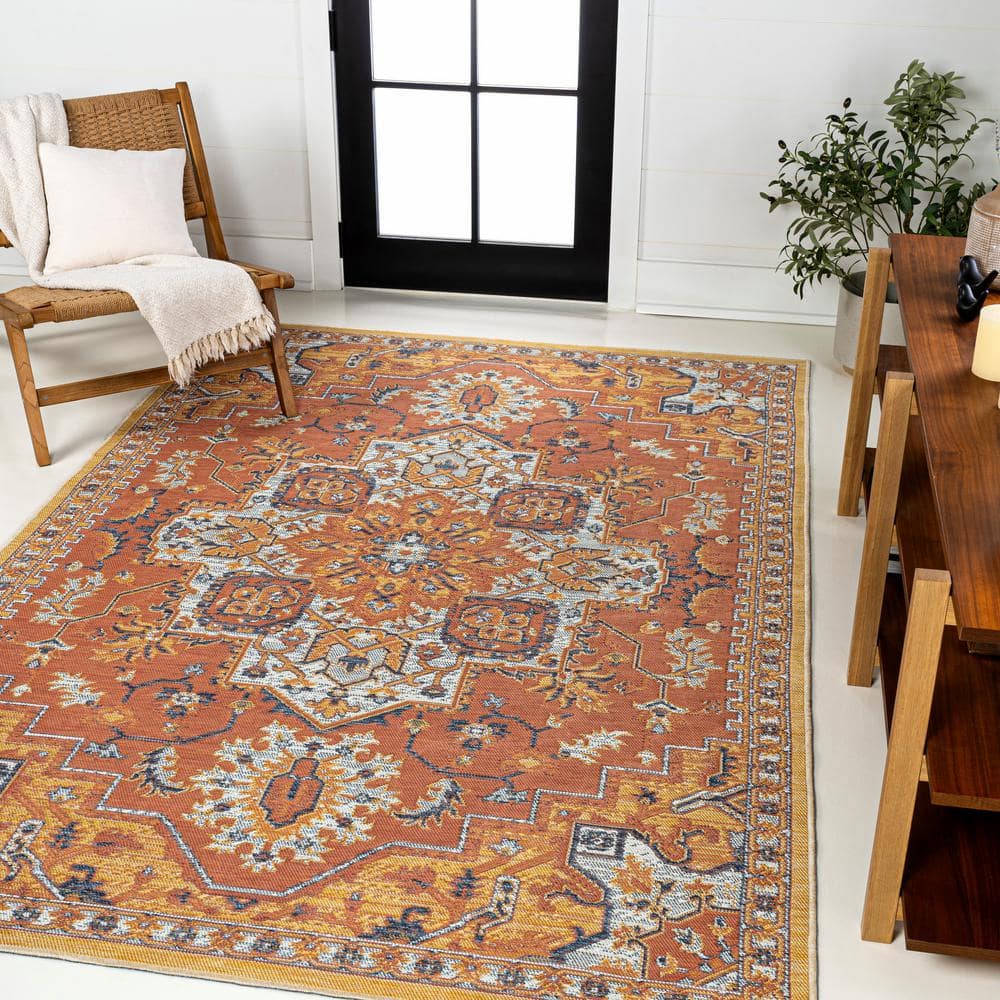 Bijan 4' x 6' Blue and Terra Medallion Synthetic Area Rug
