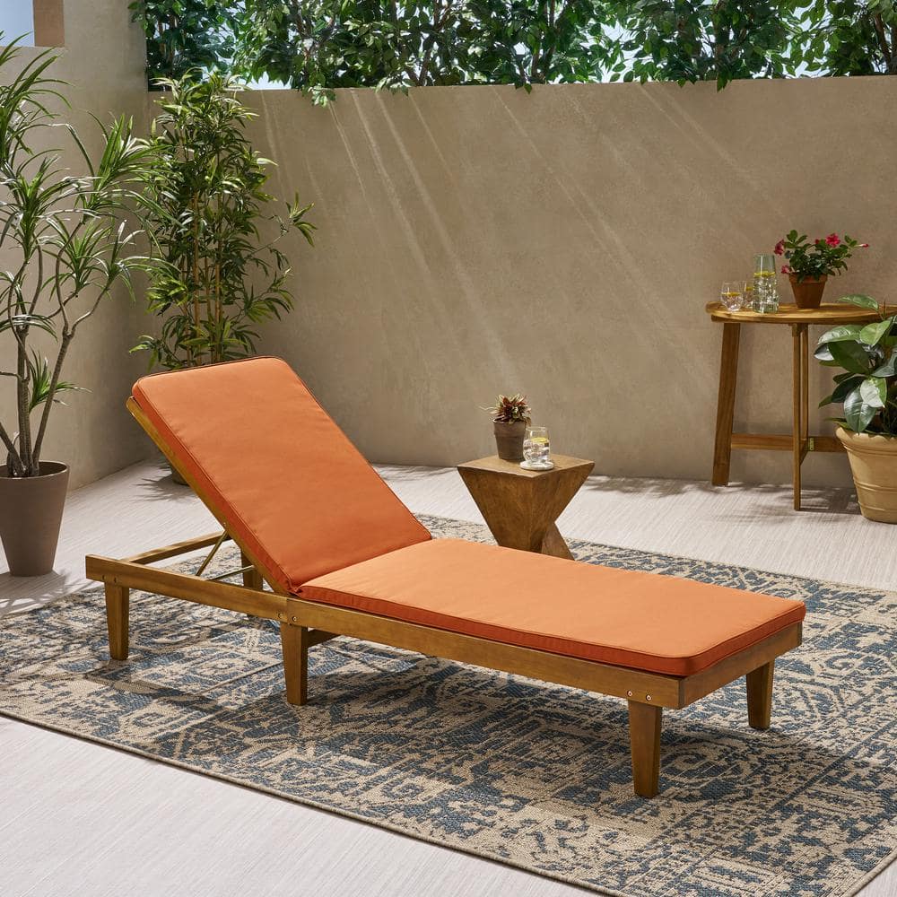 Teak Brown Outdoor Chaise Lounge with Rust Orange Cushions