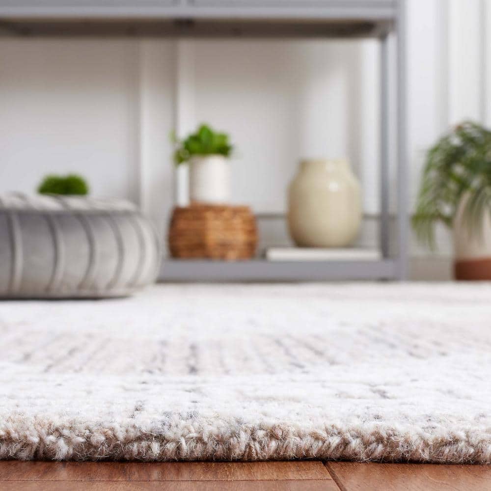 Ebony 6' x 9' Brown and Ivory Wool Tufted Area Rug