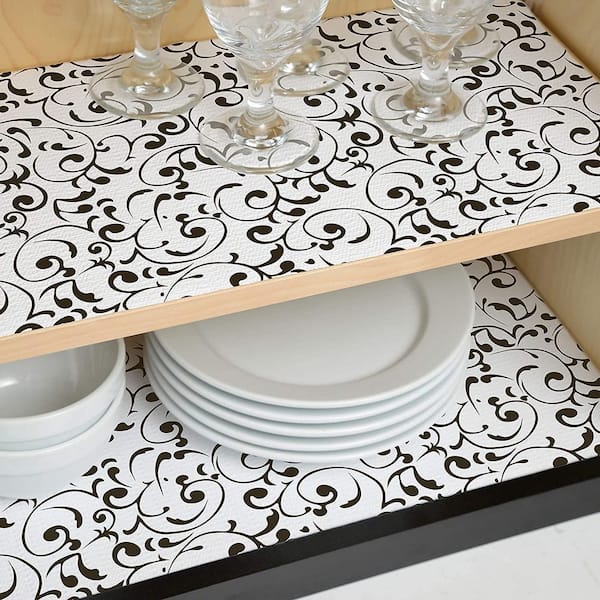 https://images.thdstatic.com/productImages/2137fbc3-8b8e-4302-9f57-c131960303d7/svn/black-and-white-floral-con-tact-shelf-liners-drawer-liners-08f-c8ar6-04-31_600.jpg