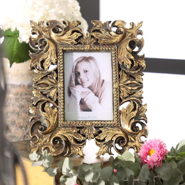 Litton Lane Gold Handmade Intricate Carved Scroll Polystone Photo Frame (2-Pack)