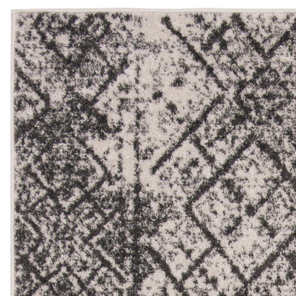 Silver & Black Synthetic Reversible Area Rug 59"x76"