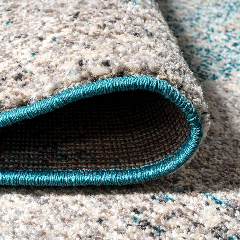 Cream and Turquoise Abstract Synthetic Area Rug