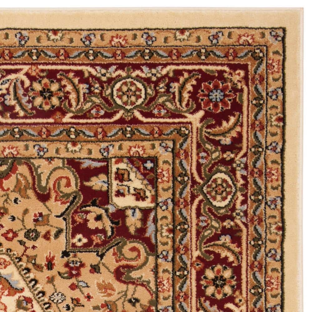 Ivory and Red Floral 6' x 9' Synthetic Area Rug