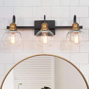 22 in. 3-Light Modern Aged Brass and Black Bathroom Vanity Light with Clear Glass Globe Shades