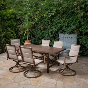 Fairhope 6 Padded Sling Swivel Rockers and a 7-Piece Steel Outdoor Dining Set with 74 in. x 40 in. Trestle Table in Tan