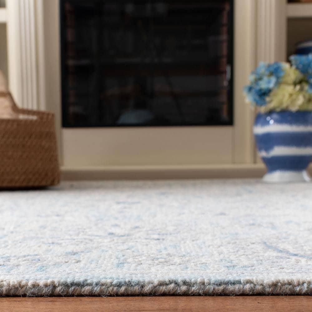 Elysian Bliss Light Blue/Ivory Hand-Tufted Wool Round Rug