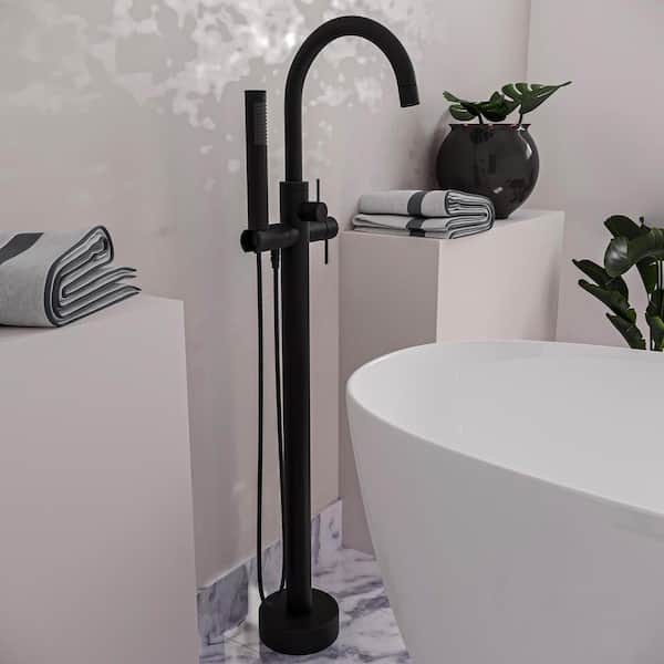 https://images.thdstatic.com/productImages/215aa6ea-dfe7-49b3-ae25-a806676fe458/svn/matte-black-westbrass-claw-foot-tub-faucets-df02043-62-31_600.jpg