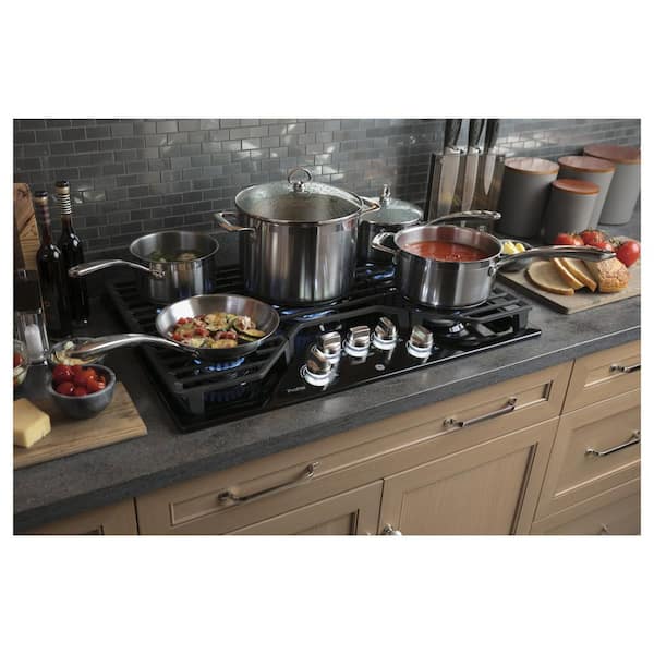 https://images.thdstatic.com/productImages/215b10be-6301-4aaf-bd4e-796ce3edb10e/svn/black-ge-profile-gas-cooktops-pgp7030dlbb-fa_600.jpg