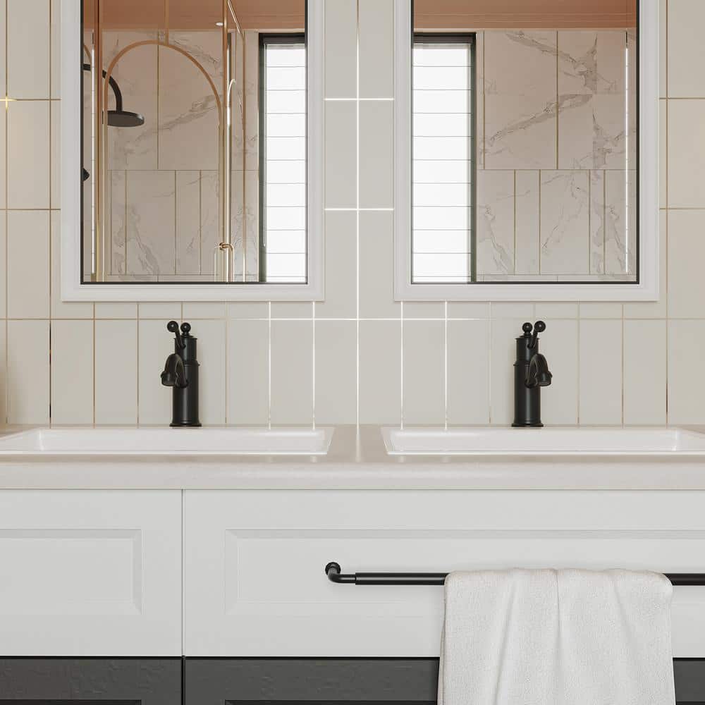 Matte Black Single-Handle Low-Arc Bathroom Faucet with Metal Drain