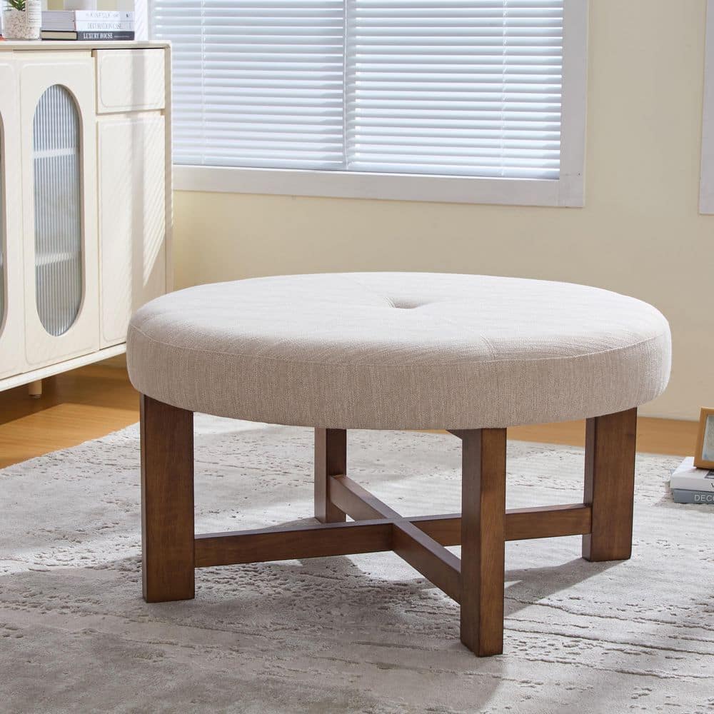 Elton Modern Beige and Natural Upholstered Fabric Round Tufted Accent Ottoman with Wood Cross Base