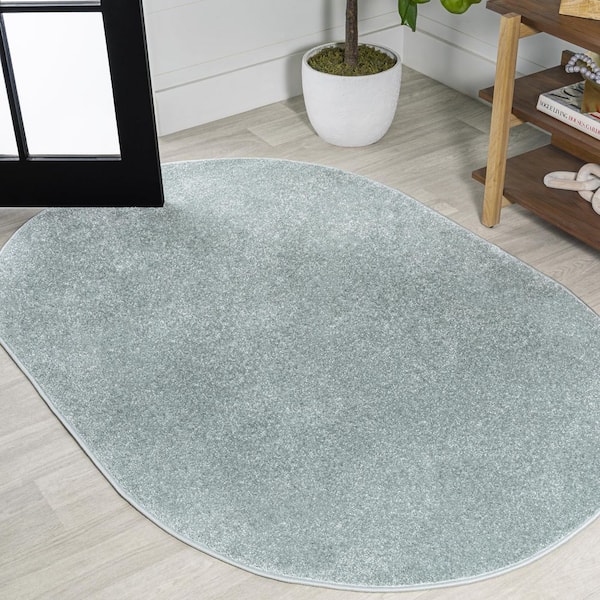 JONATHAN Y Haze Solid Low-Pile Light Blue 4 ft. x 6 ft. Oval Area Rug