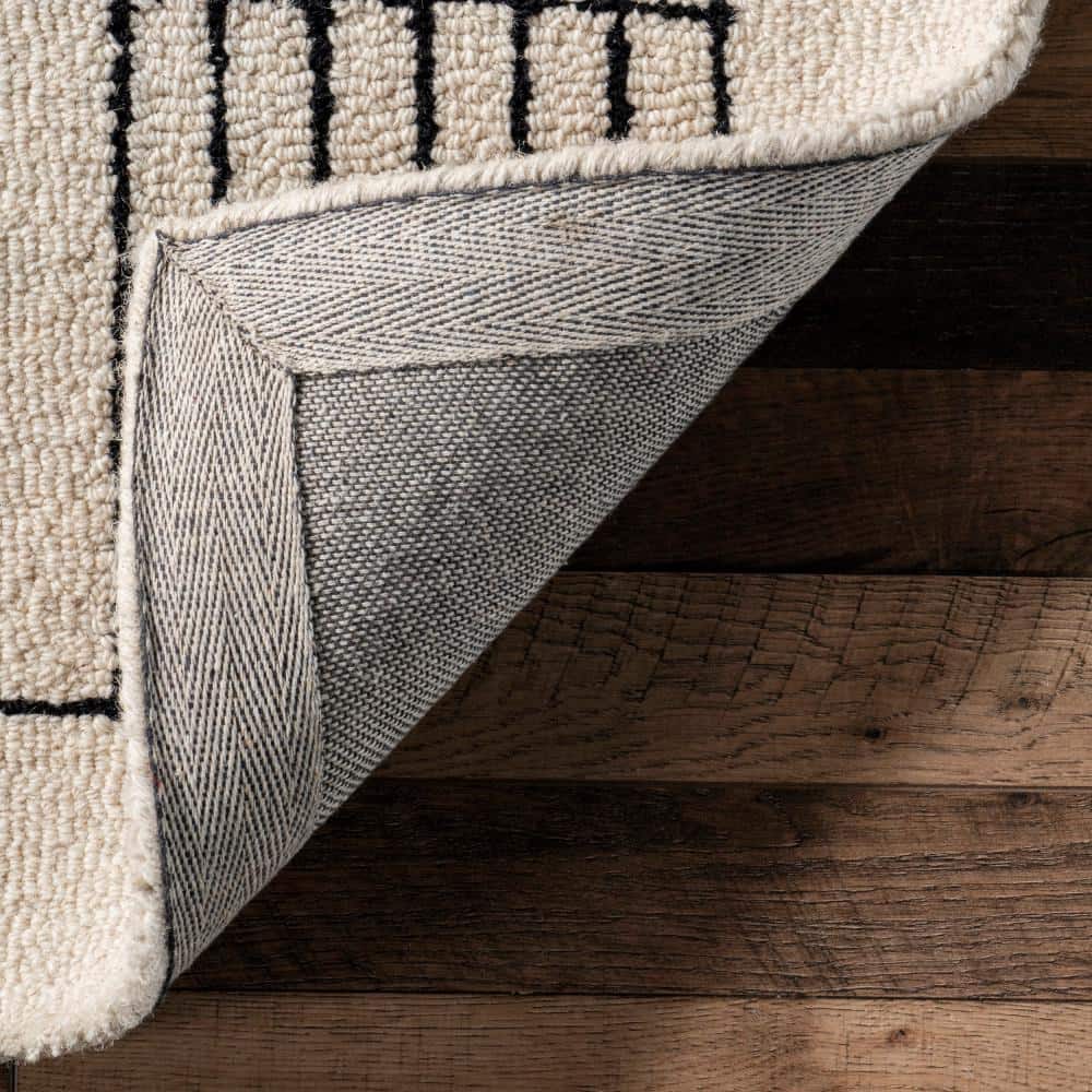 Danika Ivory 9' x 12' Handmade Wool Area Rug
