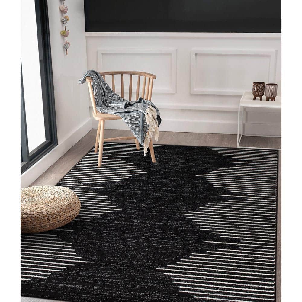 Black and White 5' x 7' Bohemian Stripe Synthetic Area Rug
