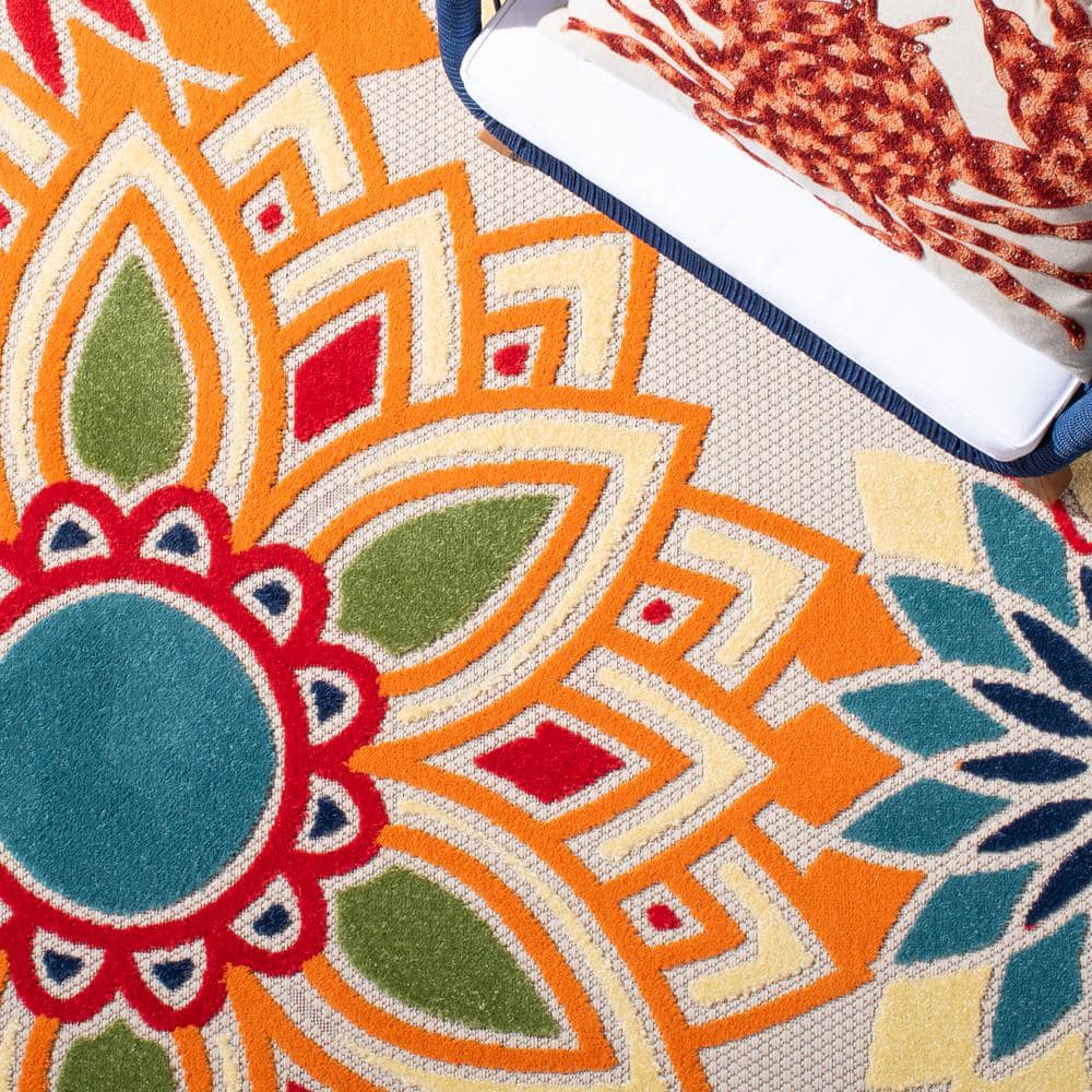 Ivory and Orange Floral Synthetic 8' x 10' Reversible Rug