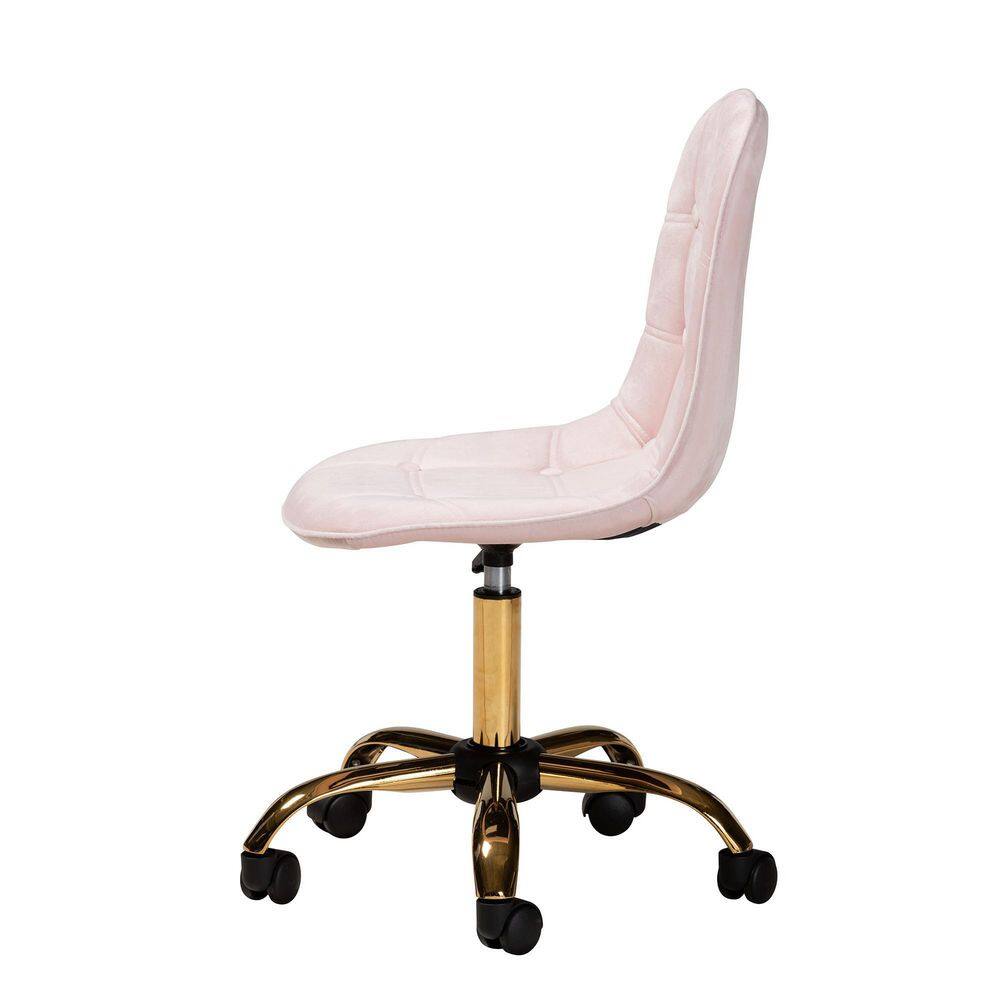 Side view of a blush pink velvet task chair with a gold base.