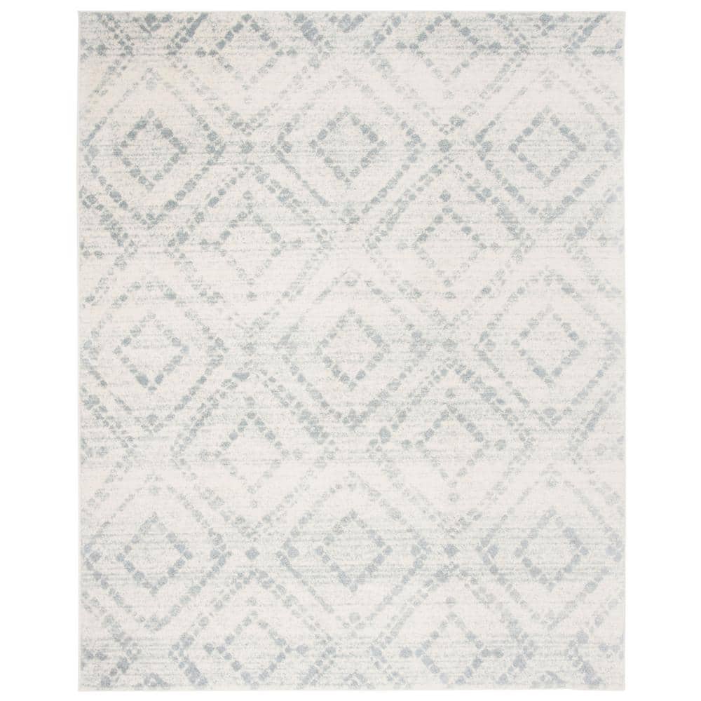 Ivory and Light Blue Geometric 9' x 12' Synthetic Area Rug