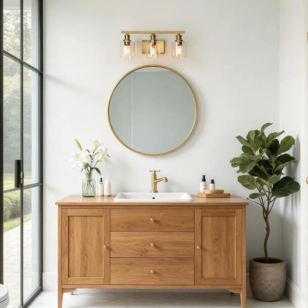 Alvra 22 in. Vintage Plated Natural Brass Bathroom Vanity Light with Clear Glass Shades, 3-Light Powder Room Wall Sconce