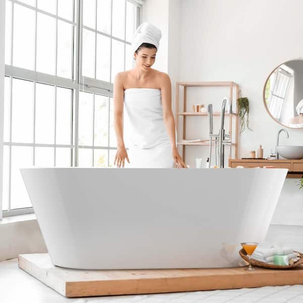Getpro 51 in. x 27.5 in. Oval Acrylic Freestanding Bathtub with Center Drain Flatbottom Free Standing Soaking Tub in White