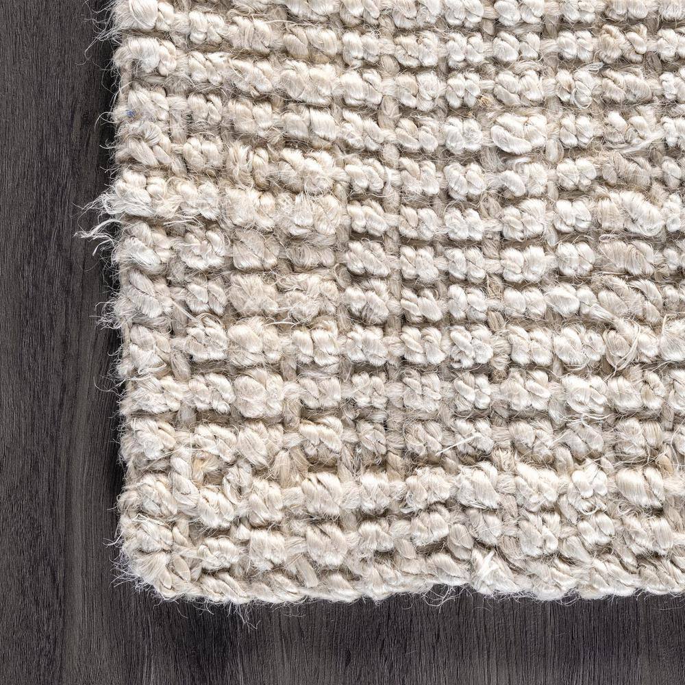 Kiwa Handwoven Off-White Jute 5' x 8' Area Rug