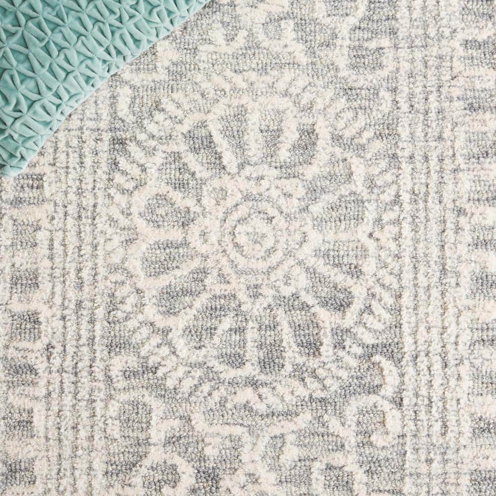 Ivory and Grey Hand Tufted Wool 4' x 6' Area Rug