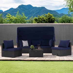 4-Piece Patio Wicker Daybed Set with Retractable Canopy and Versatile Coffee Table