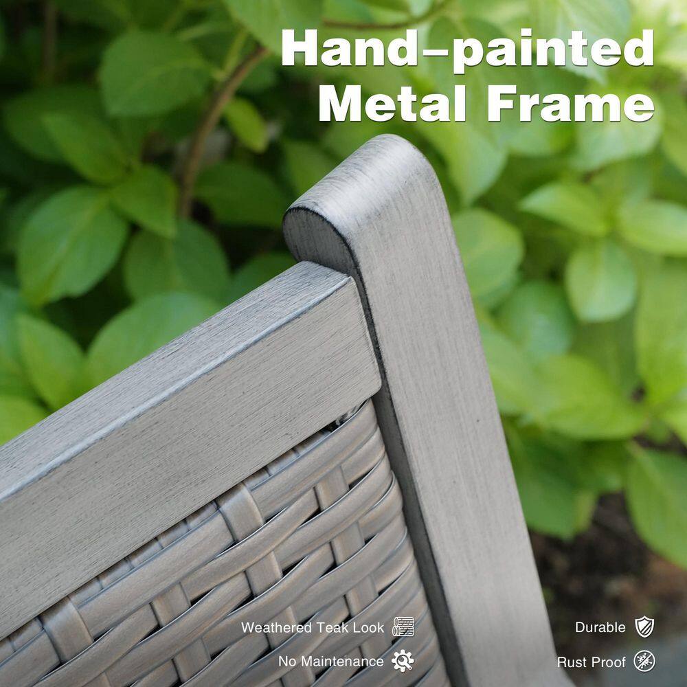 Close-up of the hand-painted metal frame of a chair.