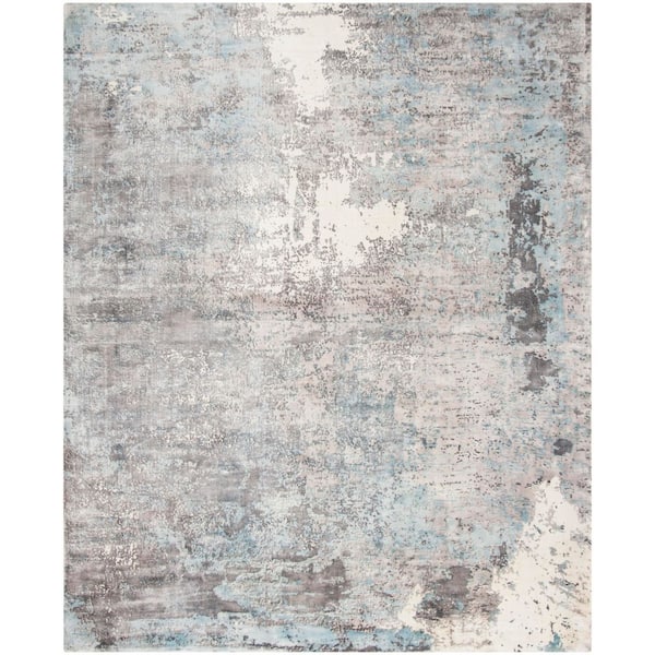 Mirage 9 ft. x 12 ft. Ivory/Blue Abstract Striped Area Rug