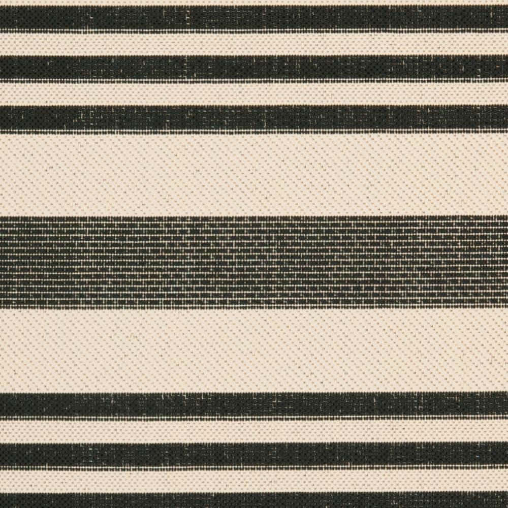 Caroline 5' x 7' Black and Beige Stripe Synthetic Area Rug