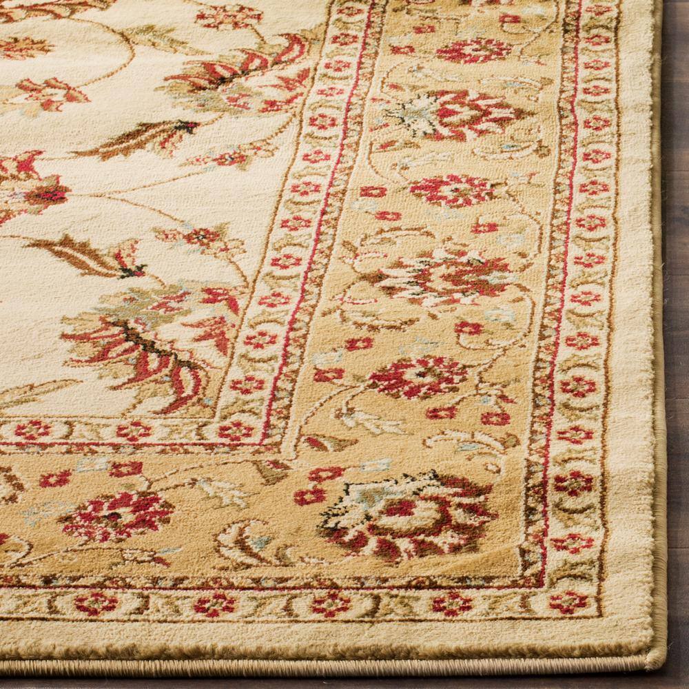 Ivory and Beige 12' x 15' Hand-Knotted Synthetic Area Rug