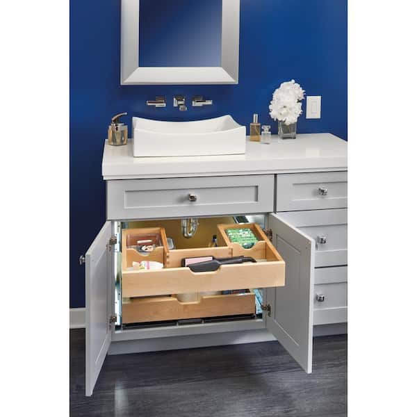 Unique U-shape fits around plumbing. With two trays, this sink base cabinet  slide-out …