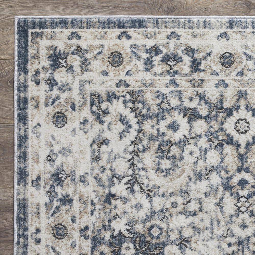 Rectangular 9' x 12' Blue Floral Synthetic Area Rug