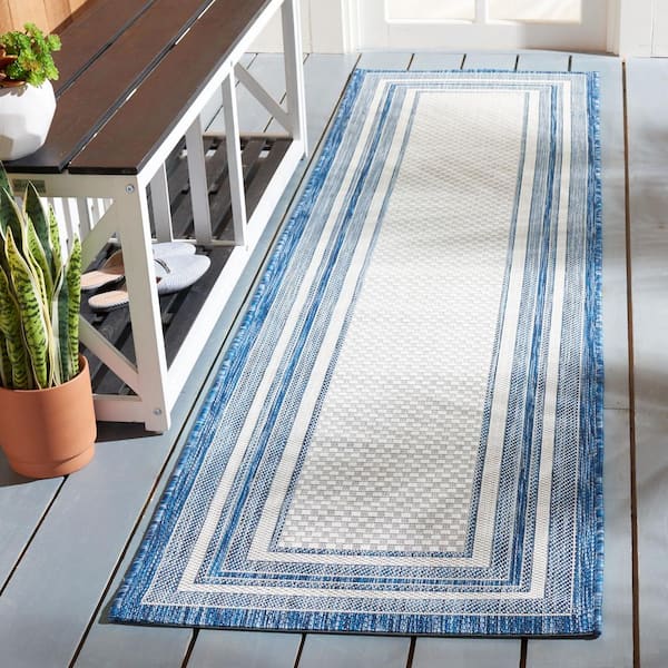 Courtyard Ivory/Navy 2 ft. x 18 ft. Solid Color Striped Indoor/Outdoor Runner Rug