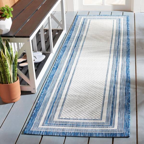 Courtyard Ivory/Navy 2 ft. x 8 ft. Solid Striped Indoor/Outdoor Patio  Runner Rug