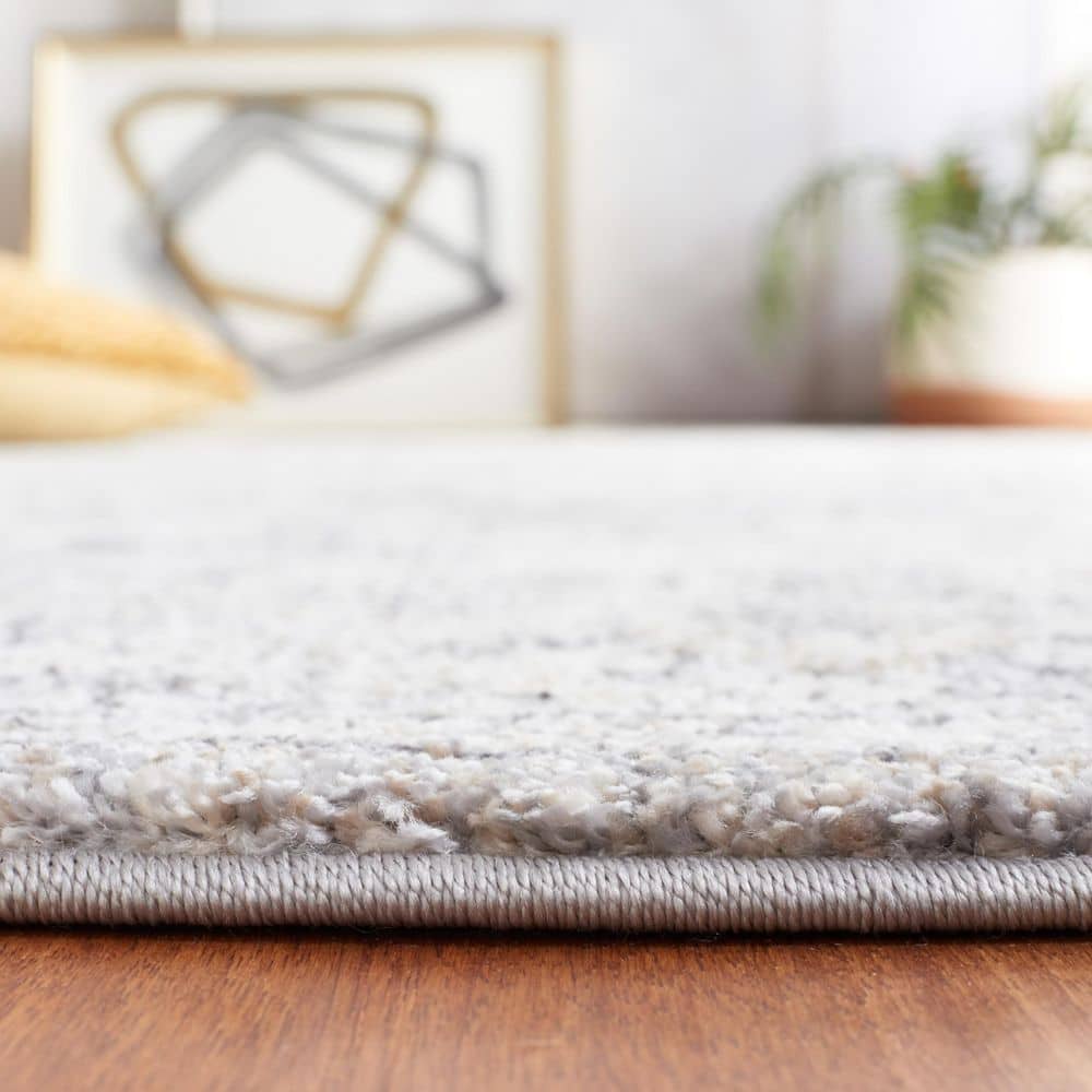 Opal Grey and Ivory Synthetic 4' x 6' Area Rug