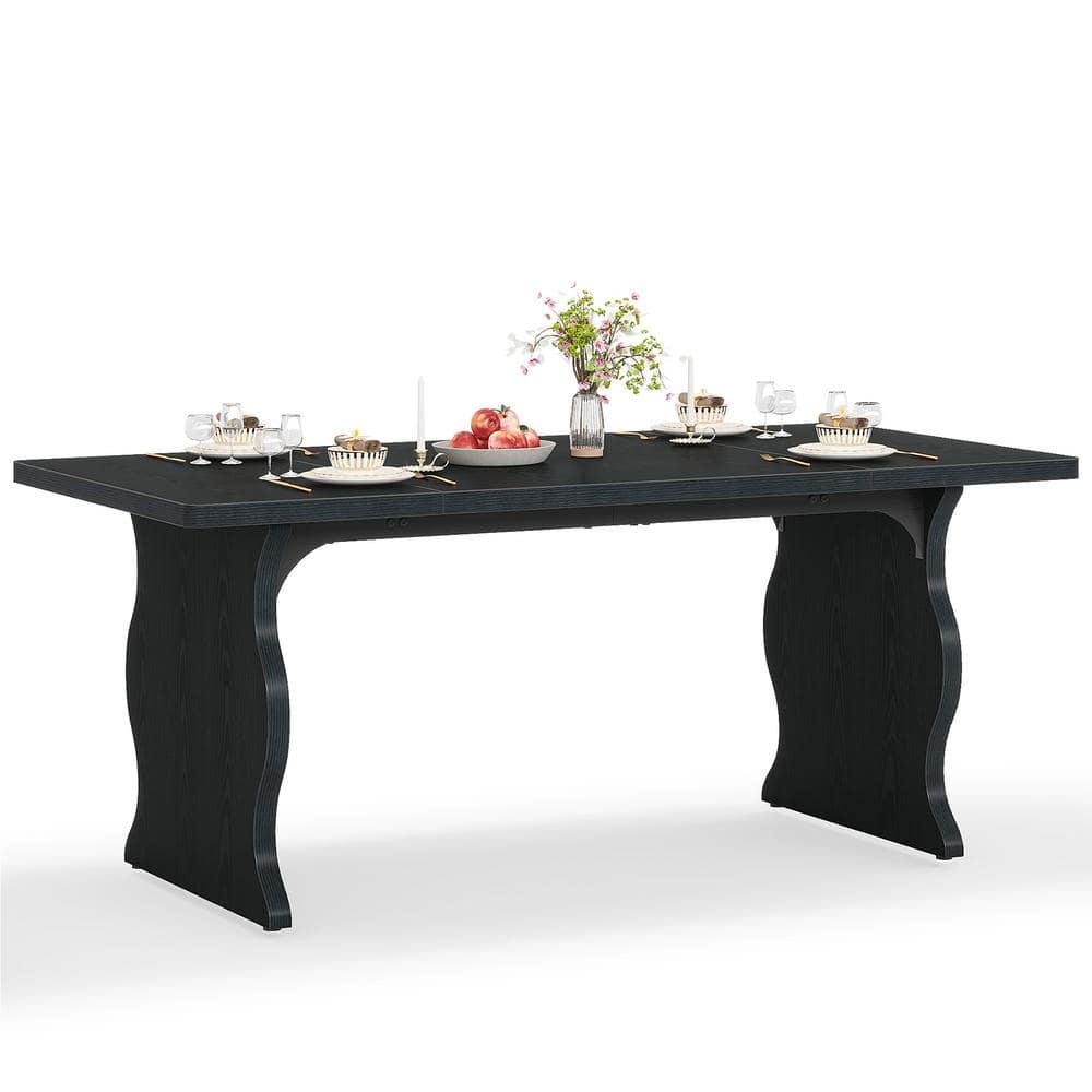 Black rectangular dining table with place settings
