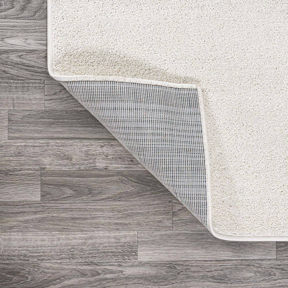 Cream Solid Synthetic Reversible 4' x 6' Area Rug