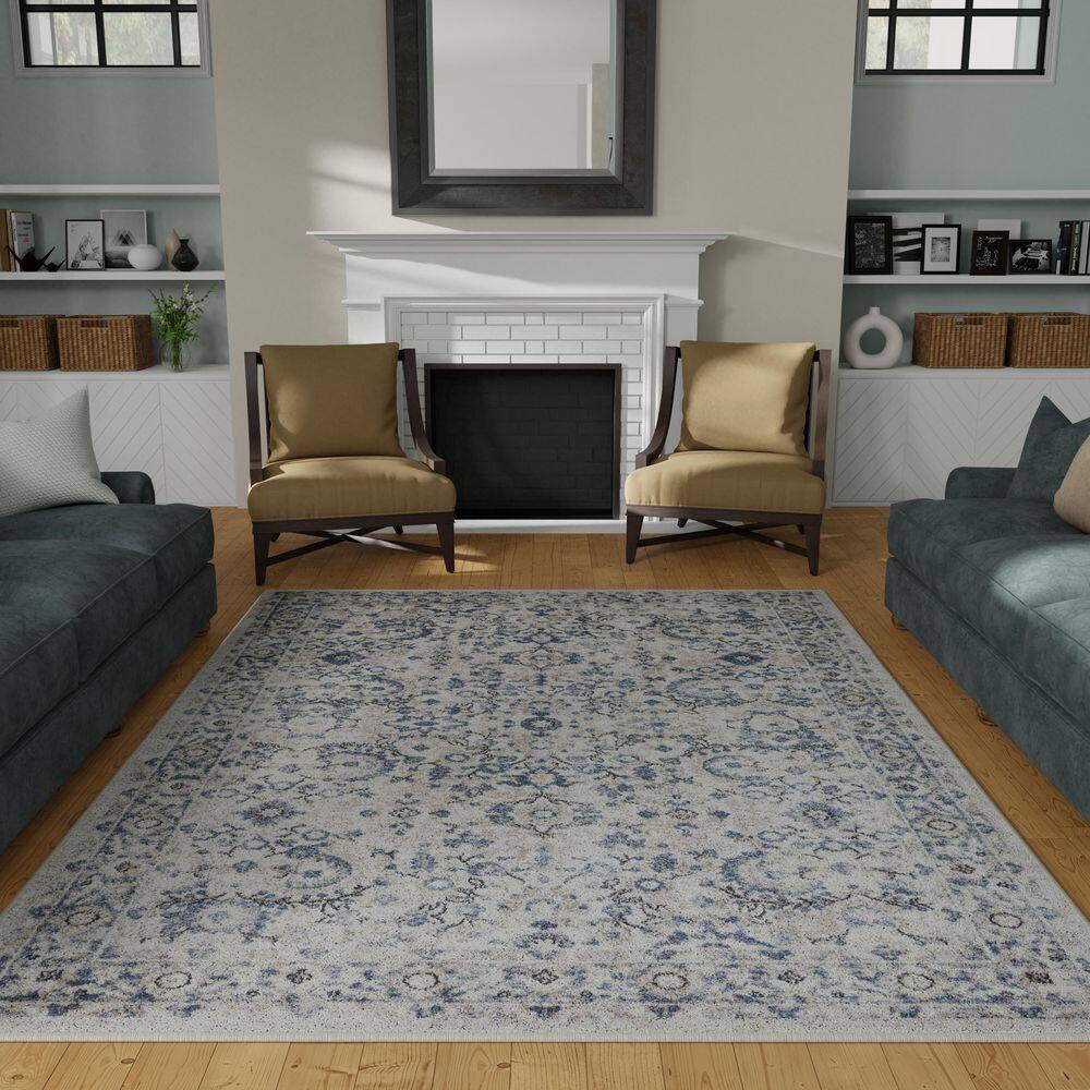Cream and Blue Floral Border 6' x 9' Synthetic Area Rug