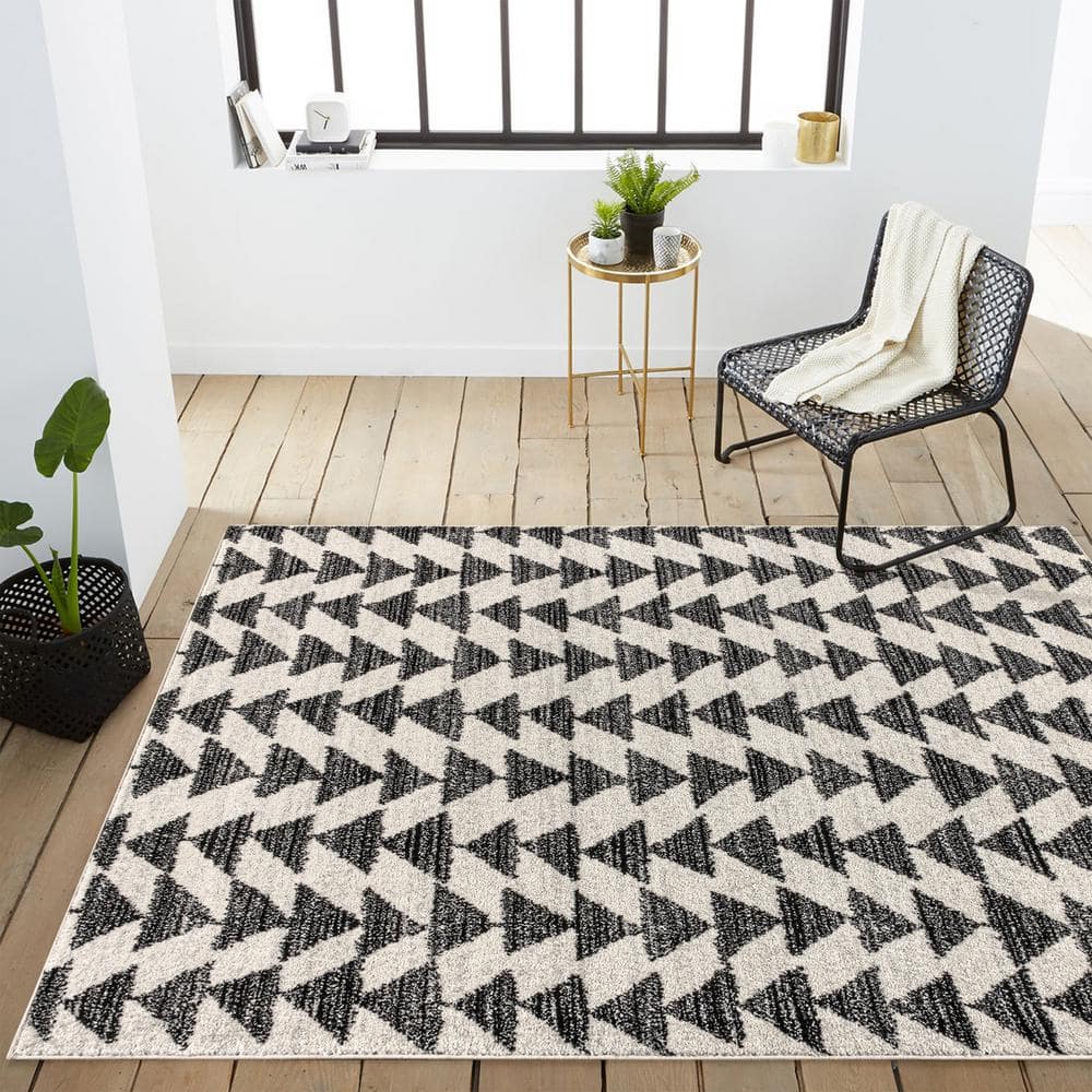 Aisha Cream and Black Geometric 10' x 14' Synthetic Area Rug